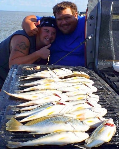 Fishin budsTasha Flores and Shaun Rice of Baytown TX tailgated this mess-o-croaker they caught on Miss Nancy shrimp