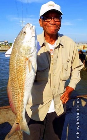 Houston angler Lawrence Godfry landed this nice 24inch slot red on live shrimp