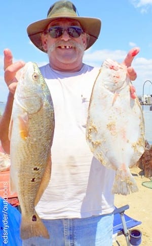 Jasper TX angler Mitch Clay fished finger mullet to catch this flounder and slot red