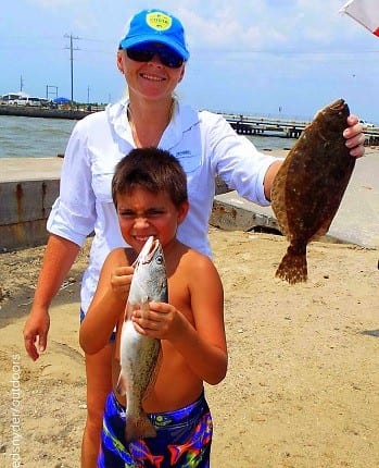 Mother and Son fishing team- Erin and Atom Moreno of Pearland TX caught these nice flounder and trout on shrimp