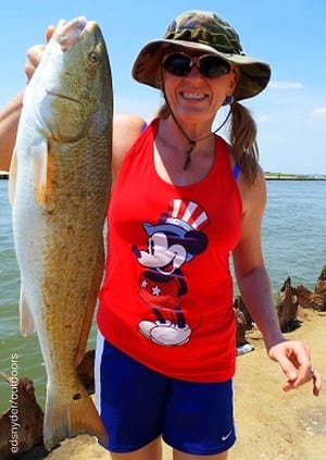 Nancy Montgomery of Splendora TX caught and boxed this 30inch tagger bull red while fishing shad