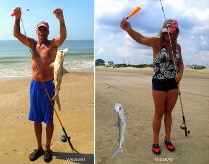 Showing off a couple of the eight sharks the Weaver Krewe caught at Rollover Beach