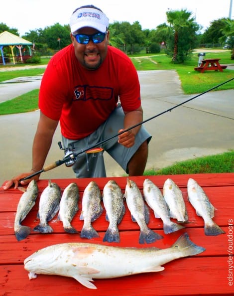 US Postal Service angler Eric -Hook-lip- Morrison of Houston TX wrangled up 9 trout topped off with an 8lb slot red