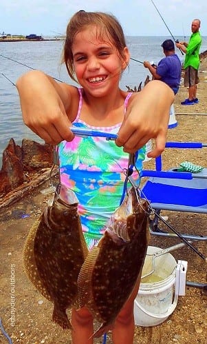 Young Ashlyan Swartz of Lumberton TX will be feeding her family tonight with these two nice flounder