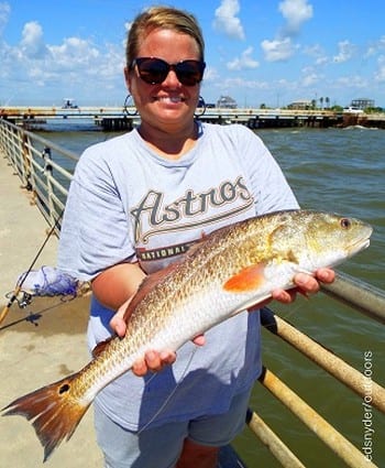 Brandy Broadway of Mont Belvieu TX fished a finger mullet to catch this nice 23inch slot red