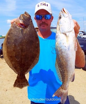 Gilchrist TX angler Doug Kudro dabbled with berkely gulp to nab this nice speck and flounder