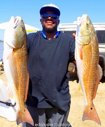 Humble TX angler Eric Watts took these twin slot reds while fishing live shrimp
