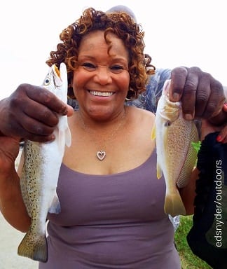 It took 4 hands for Janice Sellers to hold up her croaker and trout- the Houston angler fished shrimp
