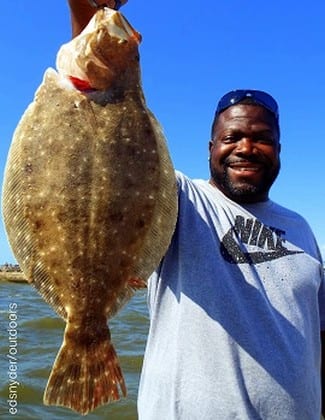Michael Polk of Humble TX landed this nice flounder while fishing with live shrimp