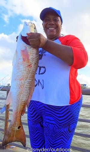 Stephenie Williams of Houston caught this nice 27inch slot red while fishing with shrimp