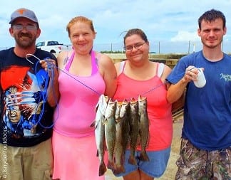 The Branden Family of Daisetta TX tethered these nice trout by fishing finger mullet