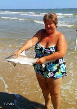 Cindy Brewer of Ennis TX wrangled up this nice TIP while fishing the surf with mullet