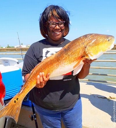 Houston anglerette Evelyn McCormick landed this HUGE 38 inch tagger bull red she took on shrimp