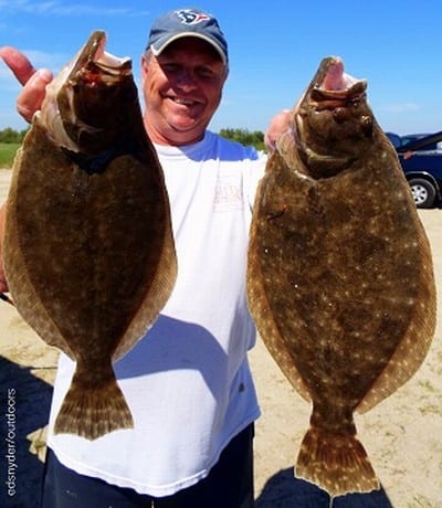 Terry Moore of Deer Park TX landed these two nice flounder on live finger mullet
