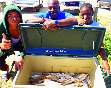 The Walker Family of Houston teamed up to load their family fish fry box with croaker they caught on shrimp