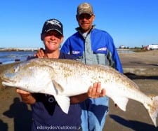 Bridgeport TX anglerette Chrystal Sixemore wrangled in this HUGE 34 inch tagger bull redfishing crab- then released it after photo ops
