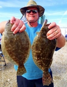 Cleveland TX angler David Fogle fished berkely gulp for these two nice flounder