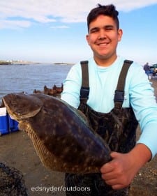 Corbin Renken of Houston caught this nice flounder while fishing with berkely gulp