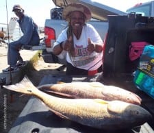 Dee Hickerson of Houston tailgated these two nice slot reds caught on shrimp