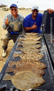 Fishin Pals Leroy Wilson of Houston and Harry Jacobs of Winnie tailgated their 10-flounder double limit they caught on finger mullet and gulp