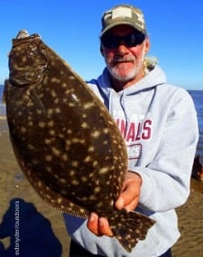 Jackie Bertolino- Proud Marine Dad from High Island TX shows off this nice flounder he took on berkely gulp