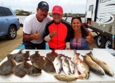 Night-Shift anglers Mike and Nora Therrell along with Nancy Wilkerson Texas Slammed Rollover waters between 2 and 3AM for these reds, flounder, and trout