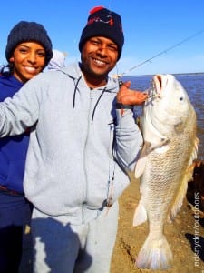 One heck of a fight, stated Juan Guzman of South Houston, after Ruby Trevino netted the huge Bull Drum - fish was released after photo ops