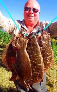 Rollover wader Jerry Weir of Gilchrist TX fished berkely gulp in the bay to tether up this nice limit of flounder