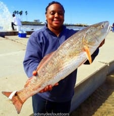 San Antonio native Regina Hinton fished a Miss Nancy shrimp for this 32inch tagger bull red
