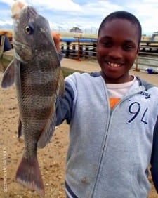 Spring ISD angler Tayshun Bowie caught his very first fish at Rollover Pass