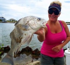 Sugar Land TX anglerette Elizabeth Amaro fished with live shrimp to catch this nice keeper eater drum