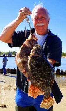 Tyler TX angler Dwight Harris doubled up with these two flounder by fishing berkely gulp