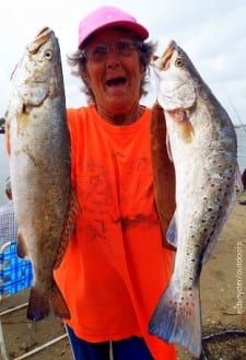 Winnie TX anglerette Barbara Singleton nabbed these two nice trout on finger mullet