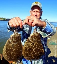 Frank Bunyard of Tarkington Prairie TX filled his limit with these two nice flounder by fishing gulp