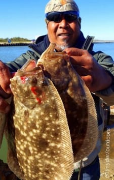 Galveston Islander Tony Calapaw bounced berkely gulps along the bulkhead to fetch these two nice flounder