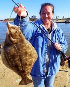 Kingswood anglerette Patricia McCrary loaded up with this nice 21inch doormat flounder she caught on a finger mullet