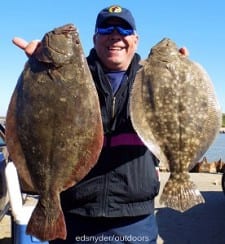 MY LIMIT for today, grinned Eddie Espinoza of Deer Park TX showing off his 21 and 22inch flounder he caught on gulp
