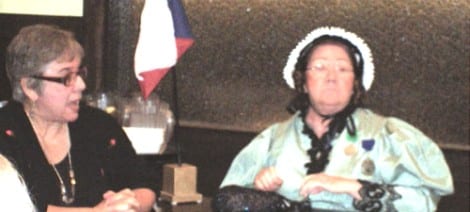 Helen Mooty as Jane Long, Mother of Texas, right, is interviewed by Brenda Beust Smith during a program presented for the Daughters of the American Revolution/Lady Houston Chapter.