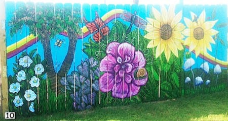 #10 RIP: Thanks to Ike, I guess, one of my most favorite murals of all, a floral delight started but never completed by artist Bar Scott, was this wonderful fence mural on Seagull, right behind Capt'N Jack's and the "water & sky" trailerhouse. 