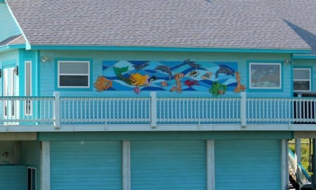 Local artist Patty Hagstrom added this colorful sea life mural to the side of her house last year. It can be seen from the beach in front of Copa Cabana Subdivision (just east of Stingaree Drive). You can see all of Patty's art on http://www.hagstromcollection.com/