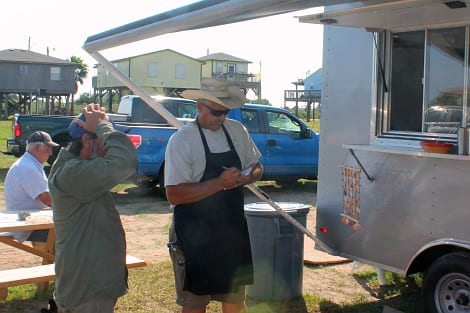 The Crabby Snack Shack! Offering burgers, chicken, dogs, nachos, shrimp poboys, sausage, and much more.