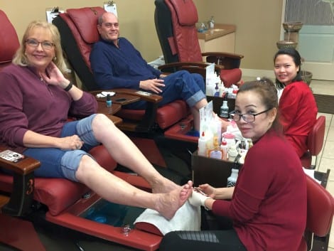 Katie and Kent Snyder enjoy pedicures by by Mai Le and Katie Nguyen.