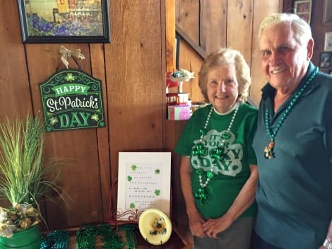 Daisy and Dewey Jones welcome guests to their St. Patrick's Day Luncheon