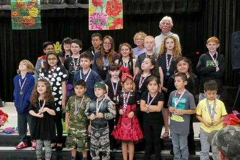 A panel of judges selected first, second, and third place winners from each grade (K thru 8)