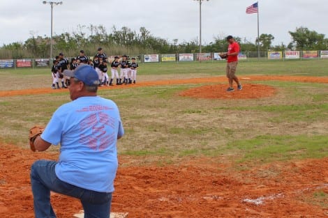Delano Comeaux throwing out the first pitch